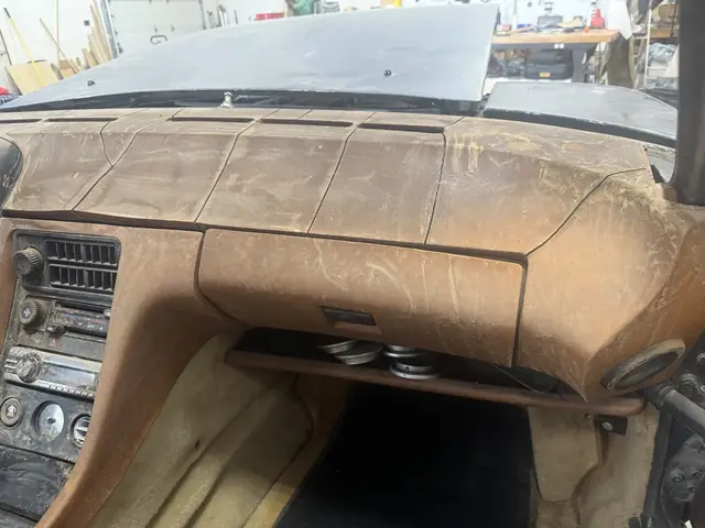 Passenger side: glovebox cracks and radio
