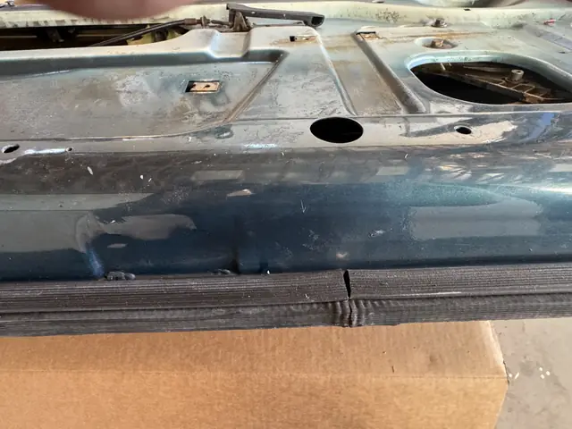 Door bottom edge