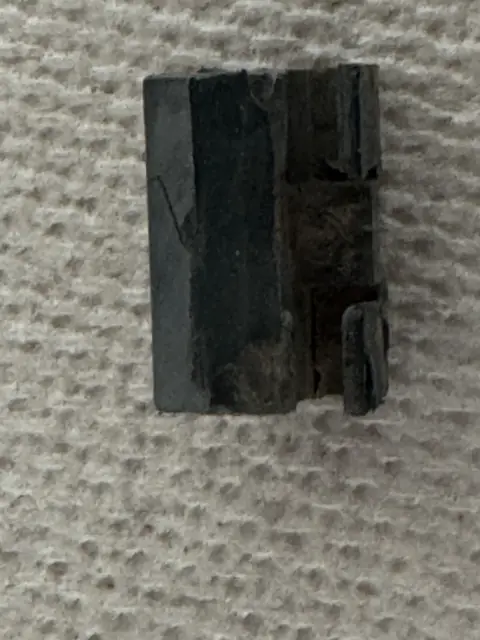 Weathered window guide spacer